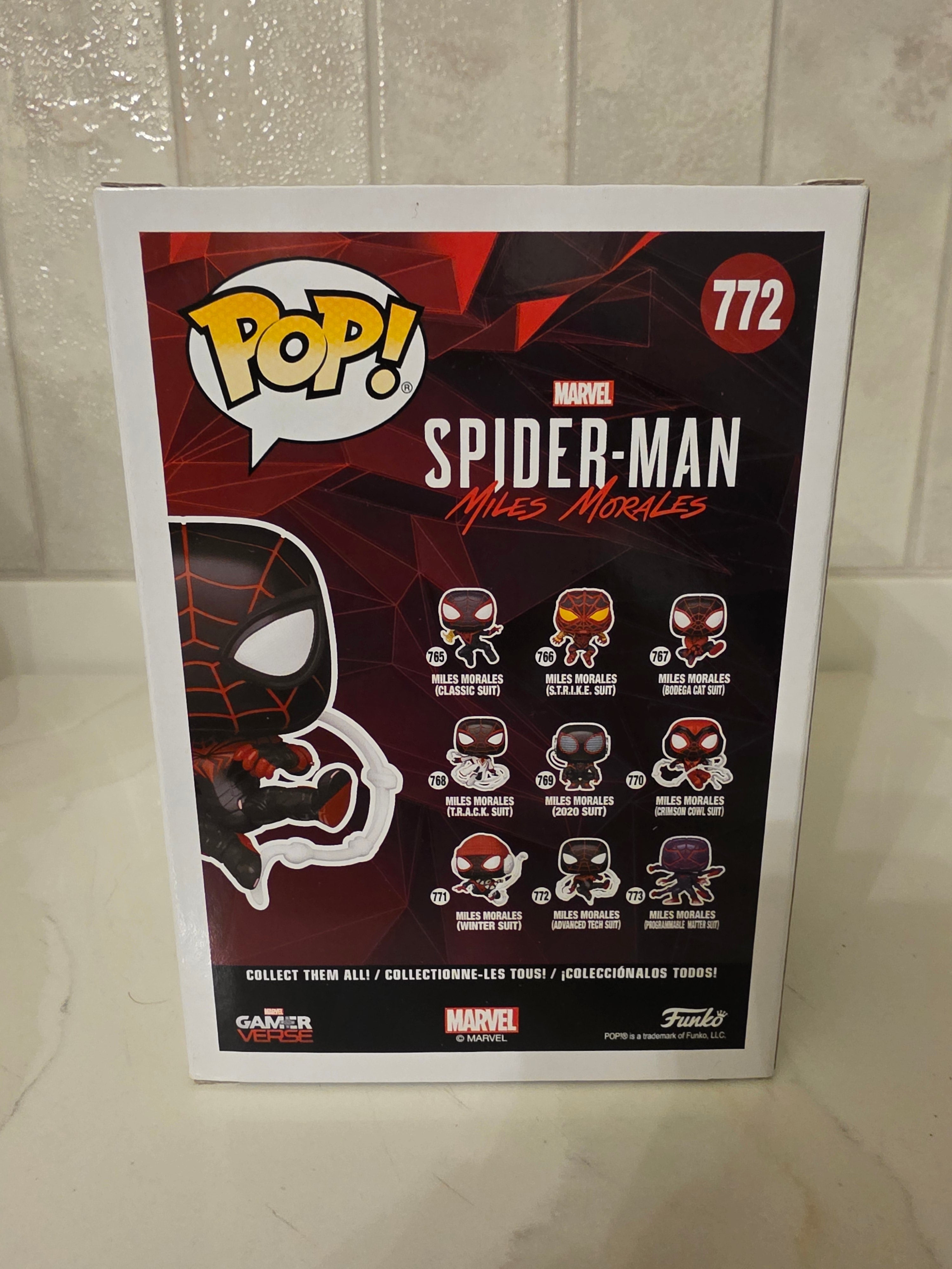 Funko Pop! Marvel Miles Morales (advanced tech suit) 772 (pre-owned) - Frog Vault Collectables