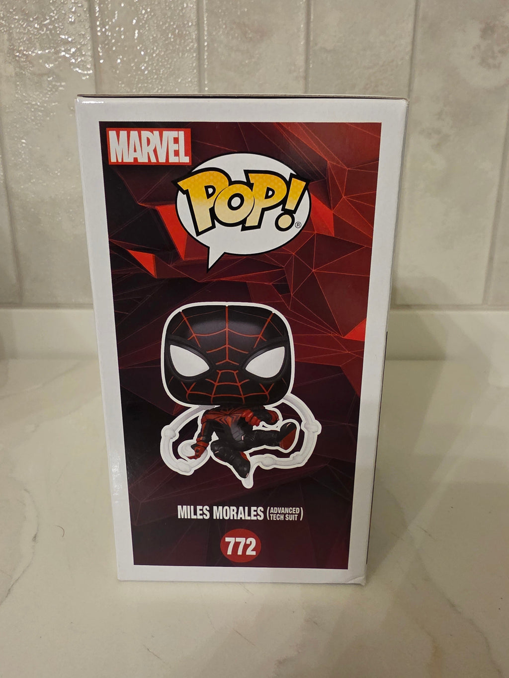 Funko Pop! Marvel Miles Morales (advanced tech suit) 772 (pre-owned) - Frog Vault Collectables