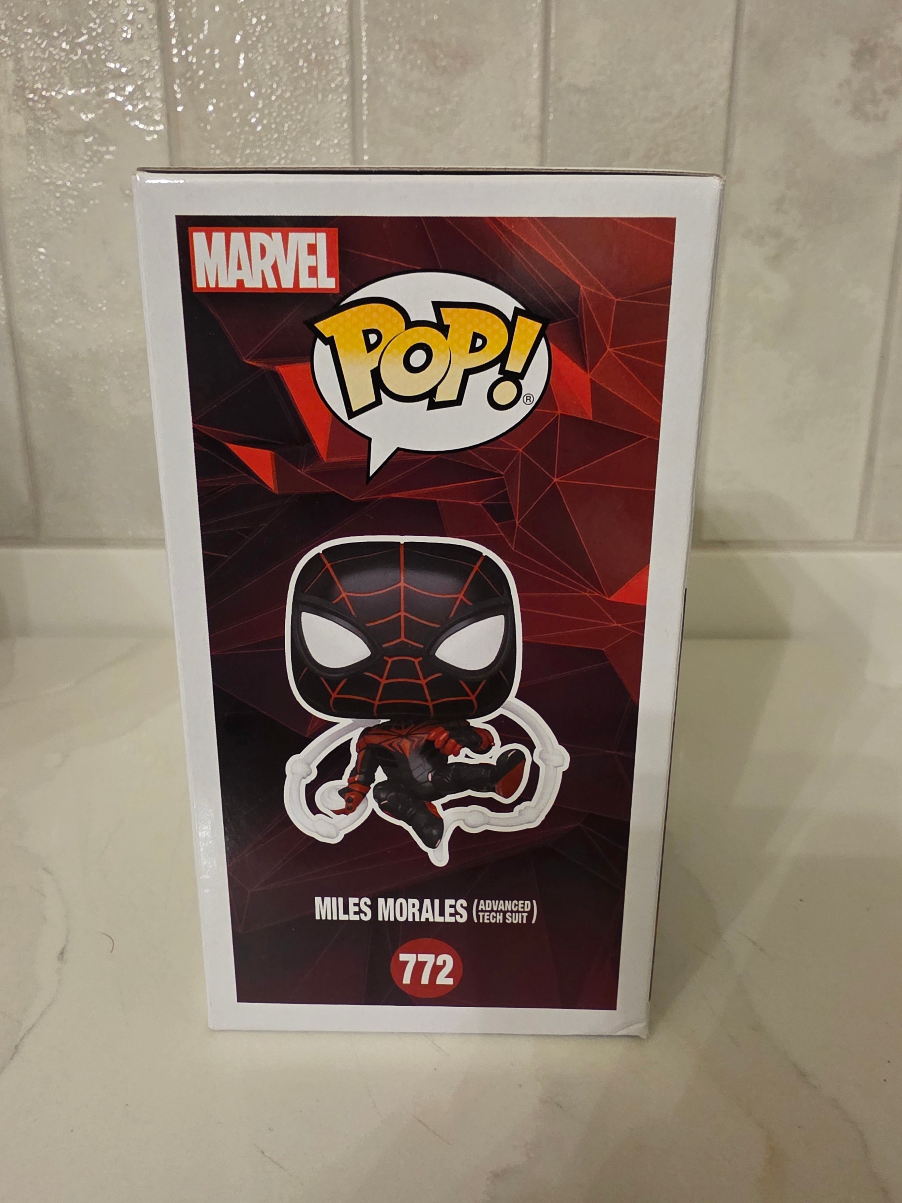 Funko Pop! Marvel Miles Morales (advanced tech suit) 772 (pre-owned) - Frog Vault Collectables
