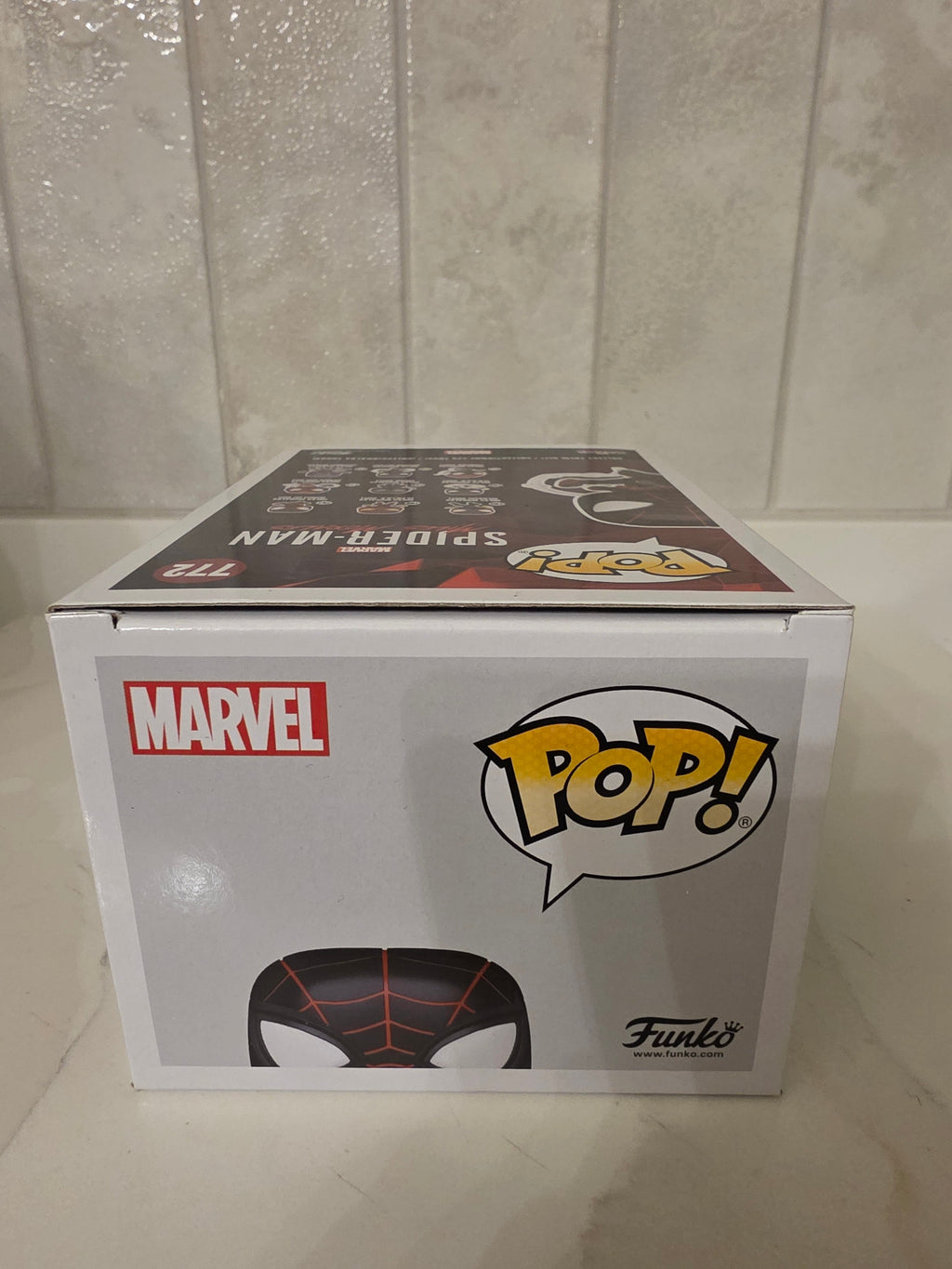 Funko Pop! Marvel Miles Morales (advanced tech suit) 772 (pre-owned) - Frog Vault Collectables