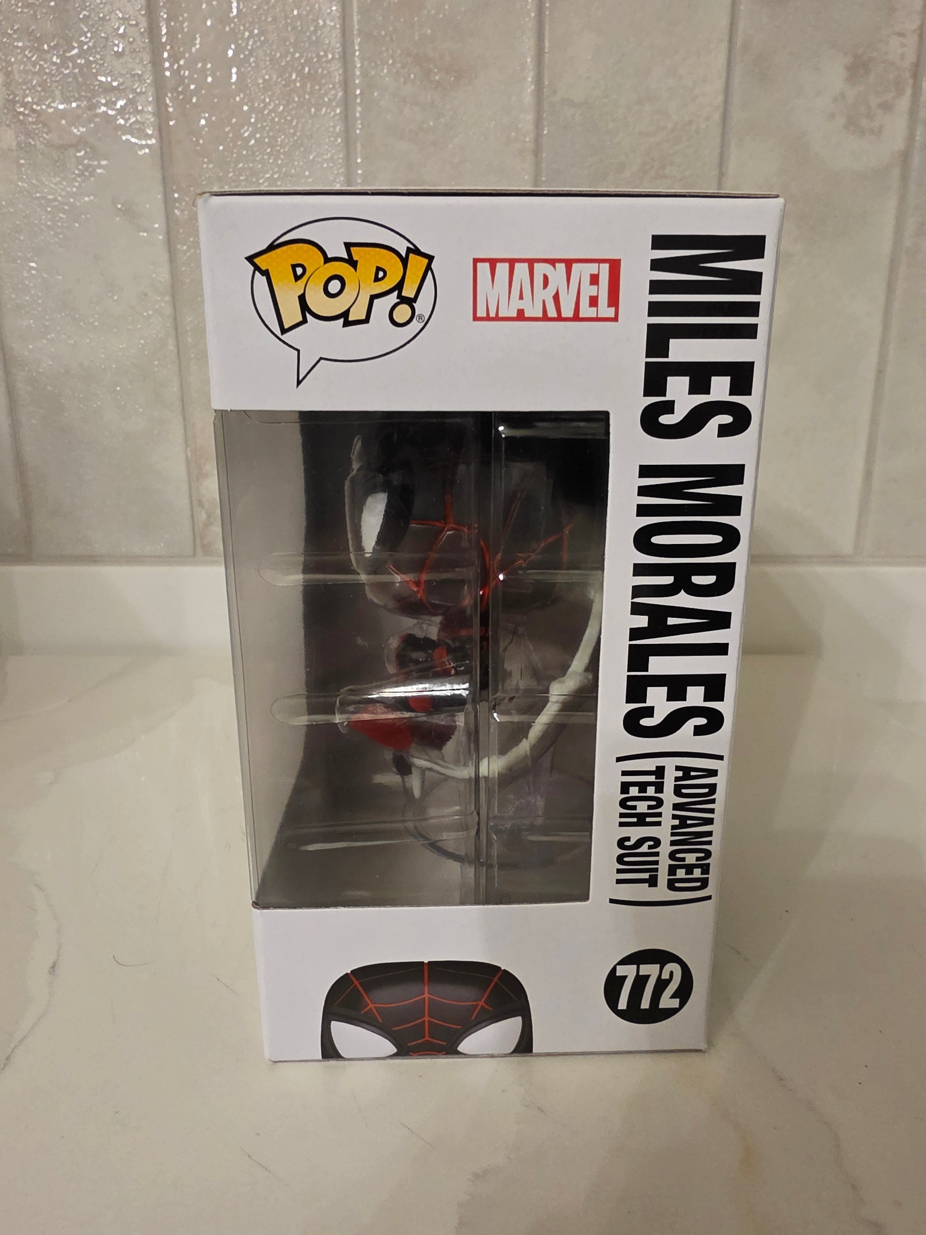 Funko Pop! Marvel Miles Morales (advanced tech suit) 772 (pre-owned) - Frog Vault Collectables