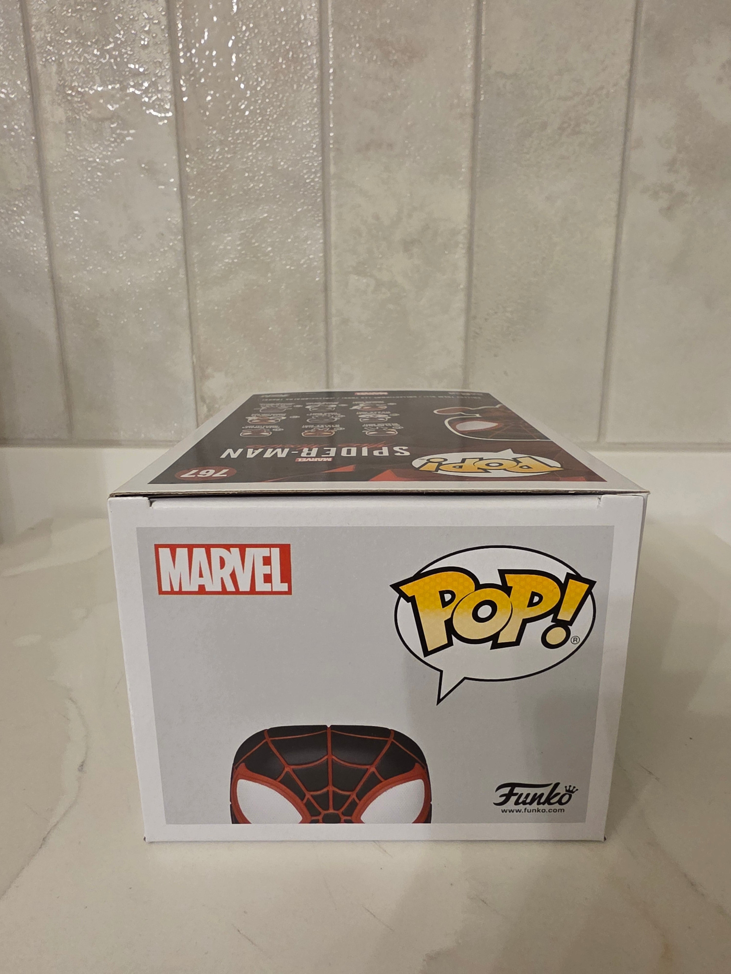 Funko Pop! Marvel Miles Morales (Bodega Cat Suit) 767 (pre-owned) - Frog Vault Collectables