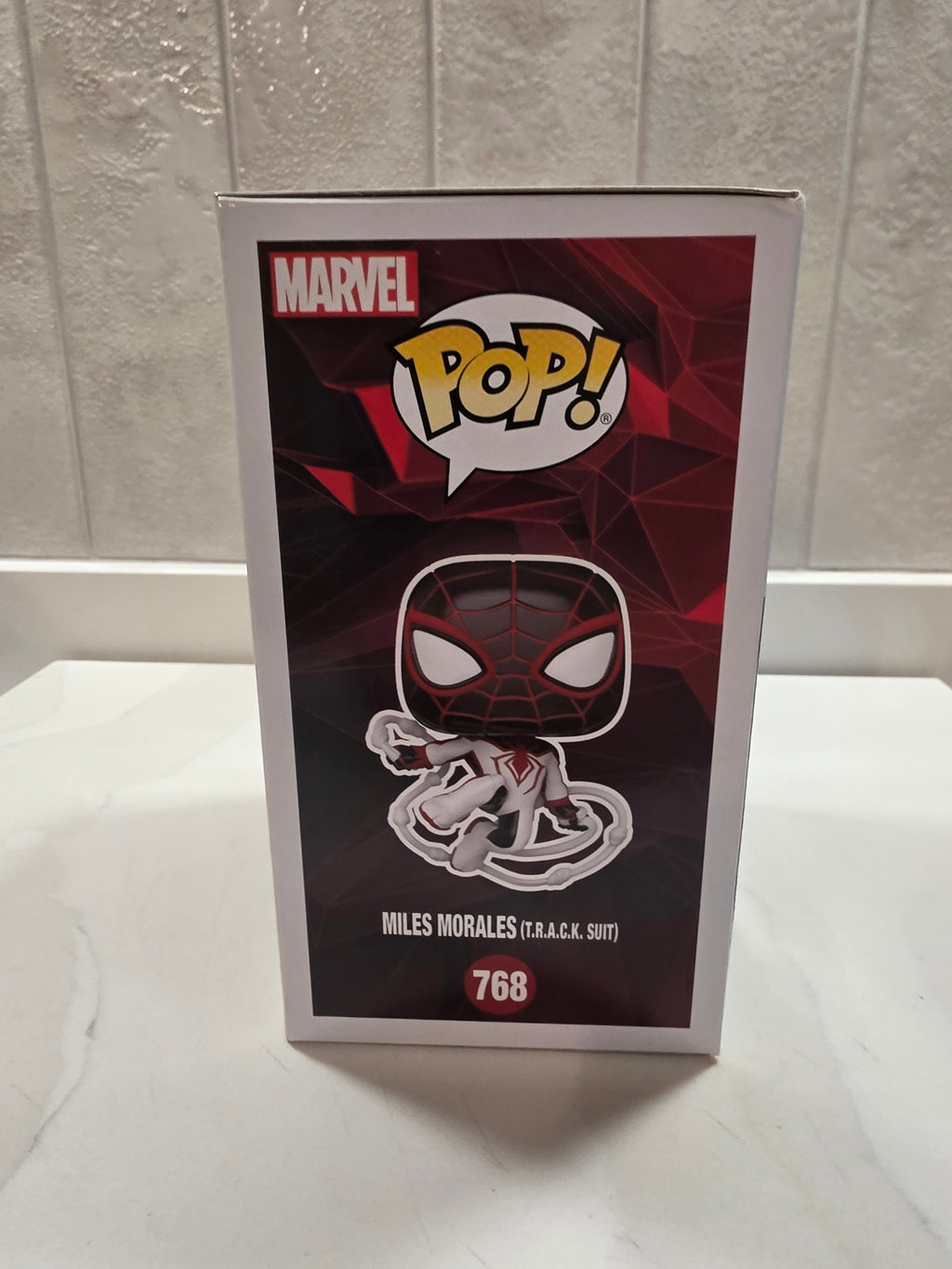 Funko Pop! Marvel Miles Morales (T.R.A.C.K. Suit) 768 (pre-owned) - Frog Vault Collectables