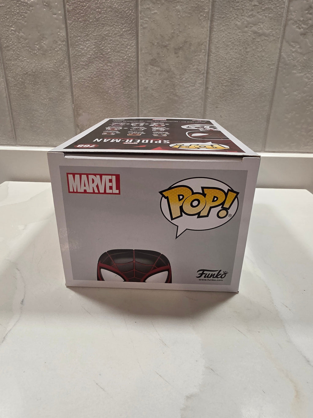 Funko Pop! Marvel Miles Morales (T.R.A.C.K. Suit) 768 (pre-owned) - Frog Vault Collectables