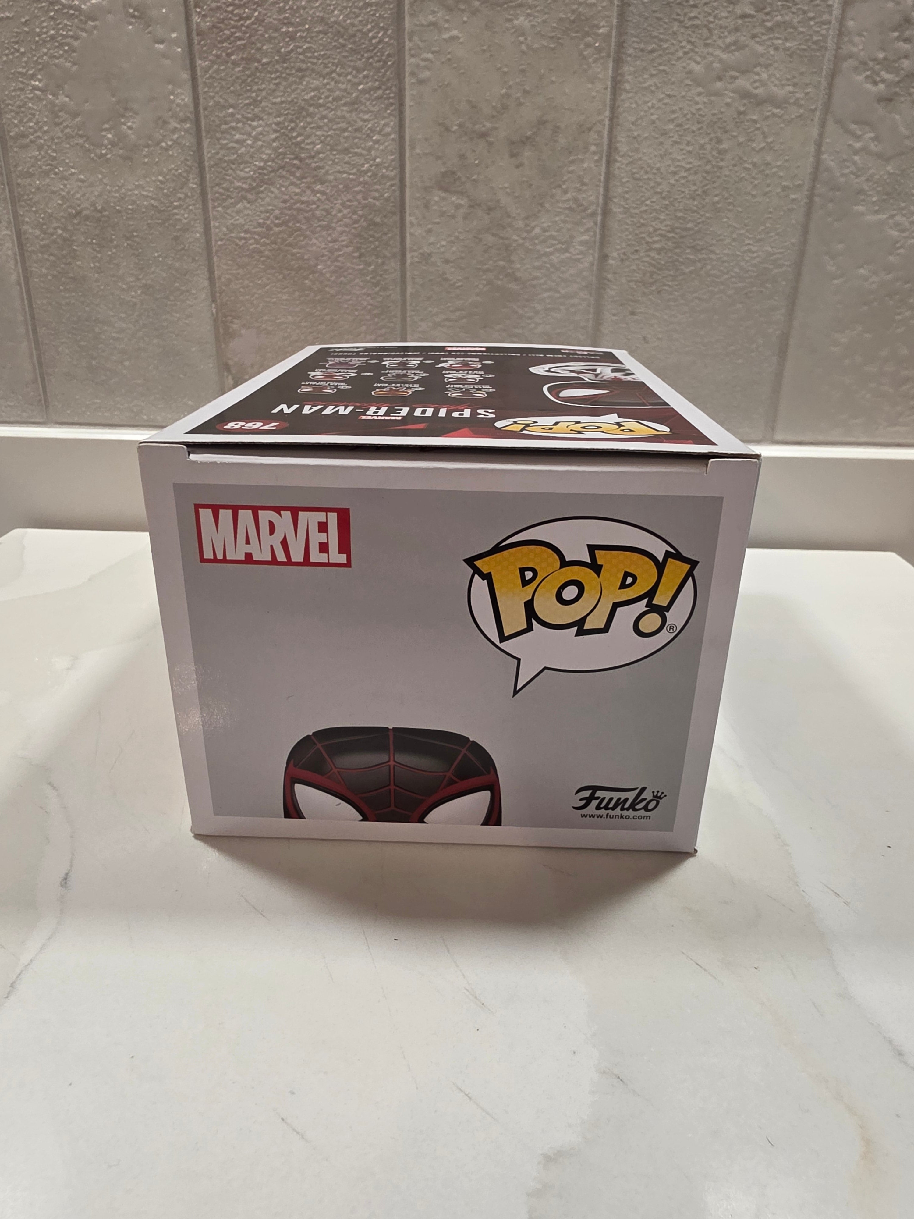 Funko Pop! Marvel Miles Morales (T.R.A.C.K. Suit) 768 (pre-owned) - Frog Vault Collectables