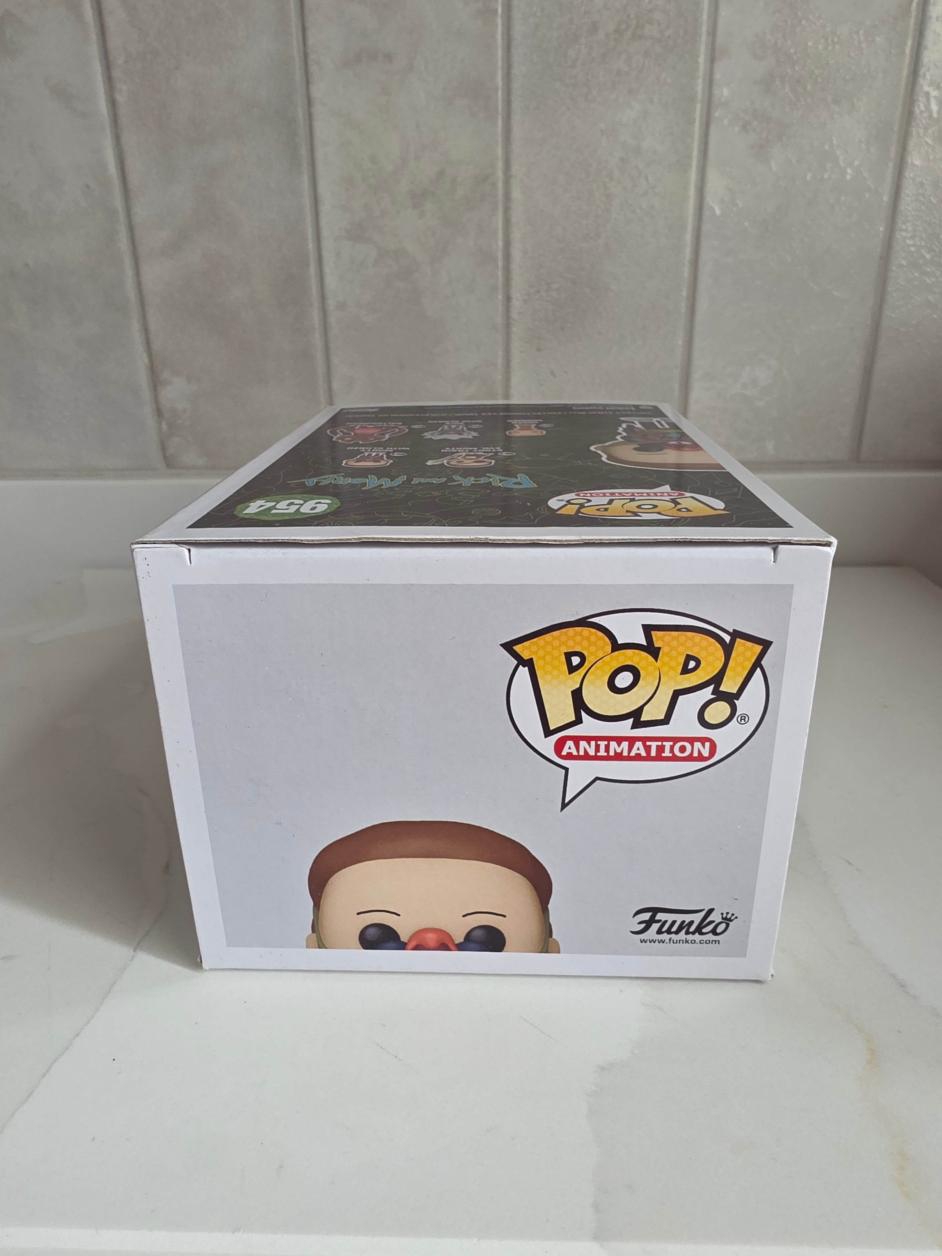 Funko Pop! Rick and Morty Morty with Glorzo 954 (pre-owned) - Frog Vault Collectables